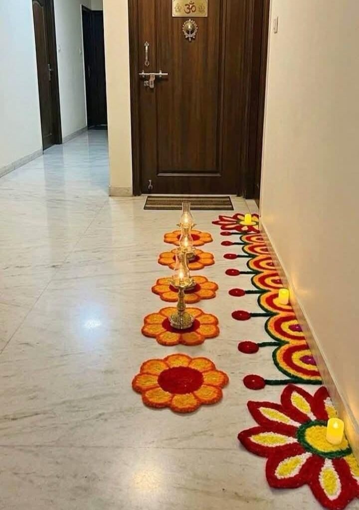 Woollen umbartha patti, samai aasan and flower mats at a real home entrance. – Kachi Rasoi